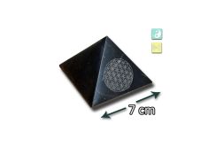 Polished Shungite pyramid 7×7 cm with Flower of Life engraving. Natural stone for balanced interiors and conscious space design.