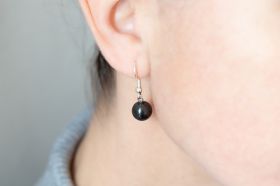 Earrings with polished natural shungite beads