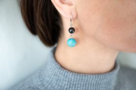 Stud earrings with shungite and howlite bead
